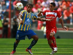 Michael Arroyo durante el duelo ante el Toluca en donde otorgó la victoria al San Luis. MEXSPORT  /