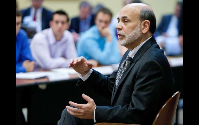 Ben Bernanke relativizó el beneficio que tendrá el programa de estímulo monetario en la cotización del dólar. AFP  /