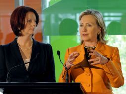 Clinton comenzó ayer una visita oficial a Australia, parte de una gira que le ha llevado antes a cinco países de diferentes. EFE  /