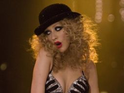 La cantante participó en la película ''Burlesque'', en la que comparte créditos con Cher y Stanley Tucci. ESPECIAL  /