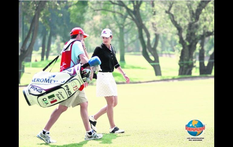 Lorena Ochoa y su esposo y caddie, Andrés Conesa, tuvieron un día difícil. E. PACHECO  /