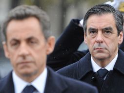 Imagen de archivo. En primer plano, el presidente Nicolas Sarkozy, al fondo, Francois Fillon, recién renombrado primer ministro. AFP  /