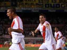 El ex jugador de Boca, Jonatan Maidana (izq), marcó el gol de la victoria y su primer tanto en la primera división. EFE  /