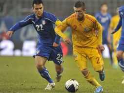 Italia y Rumania concluyeron el juego amistoso en un empate a un gol. AP  /