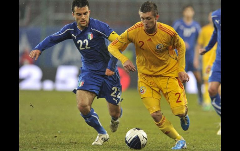 Italia y Rumania concluyeron el juego amistoso en un empate a un gol. AP  /