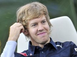 El actual campeón del mundo Sebastian Vettel destaca lo difícil que el conseguir el título. AP  /