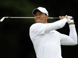 Tras perder su matrimonio y el primer sitio del golf mundial, Tiger Woods quiere resurgir. AP  /