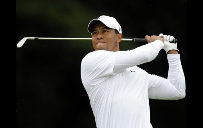 Tras perder su matrimonio y el primer sitio del golf mundial, Tiger Woods quiere resurgir. AP  /