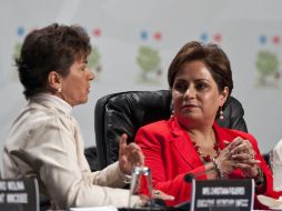 Christiana Figueres y Patricia Espinosa en la inauguración de la XVI Conferencia de Naciones Unidas sobre Cambio Climático. AFP  /