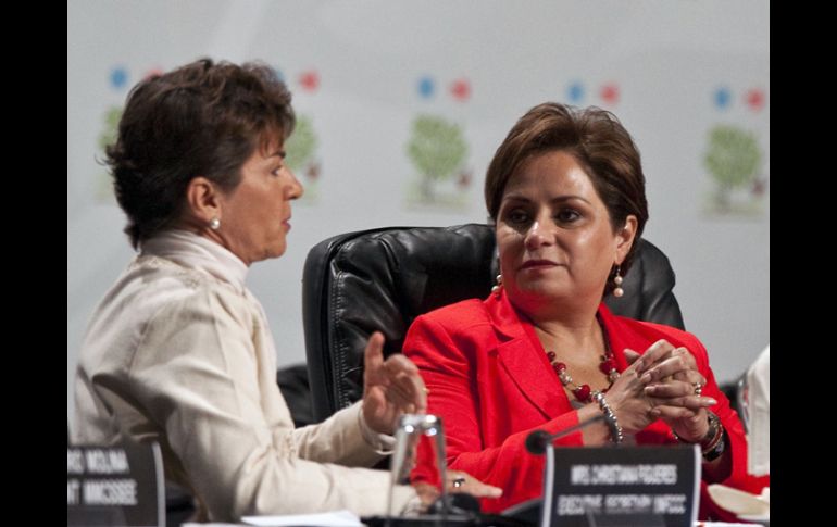 Christiana Figueres y Patricia Espinosa en la inauguración de la XVI Conferencia de Naciones Unidas sobre Cambio Climático. AFP  /