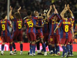 El equipo del Barcelona festejando la victoria del Clásico español. AFP  /