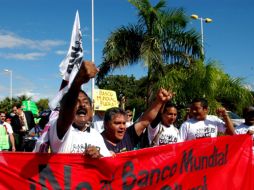 Activistas piden la salida del Banco Mundial de las negociaciones de la COP-16. NOTIMEX  /