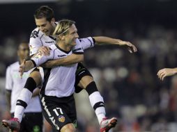 El Valencia empató 3-3 ante el Osasuna pese a que este pudo llevarse la victoria en la recta final. AP  /