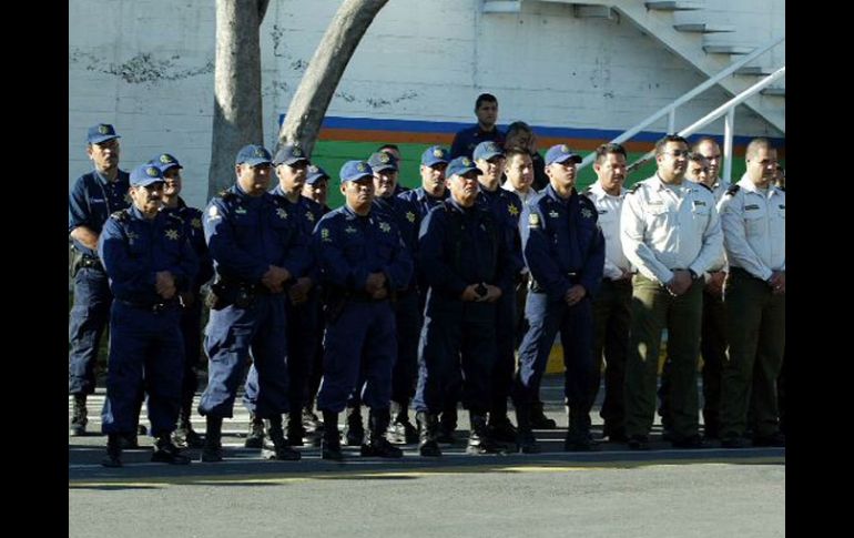 Policías fueron detenidos por su probable participación en atentado contra unidades de la Agencia Estatal de Investigaciones. ARCHIVO  /