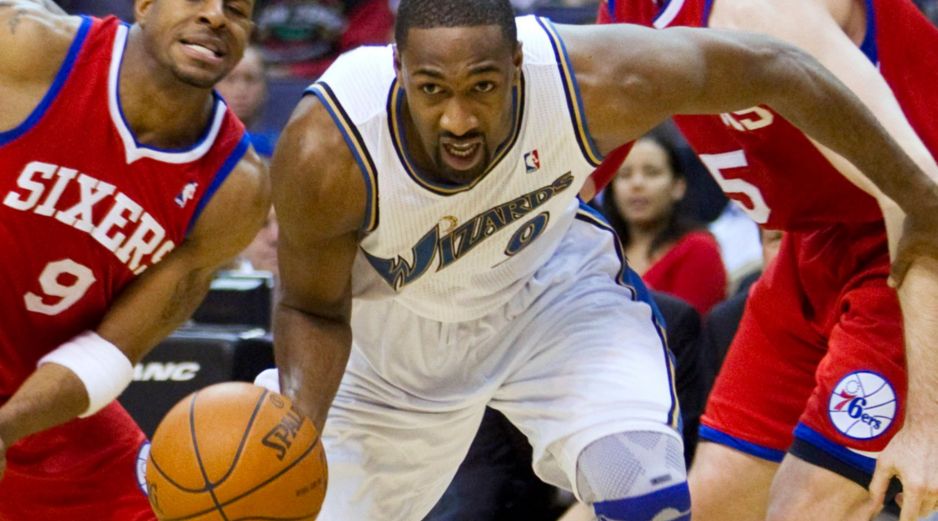 El base Gilbert Arenas, en un partido contra los 76ers. AP  /