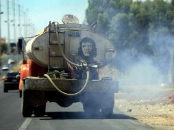 Automotor con liberación de contaminantes. ARCHIVO  /