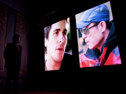 Muestran en una pantalla a Bale y el director  Zhang Yimou, durante una conferencia de prensa para promocionar la nueva película. AP  /