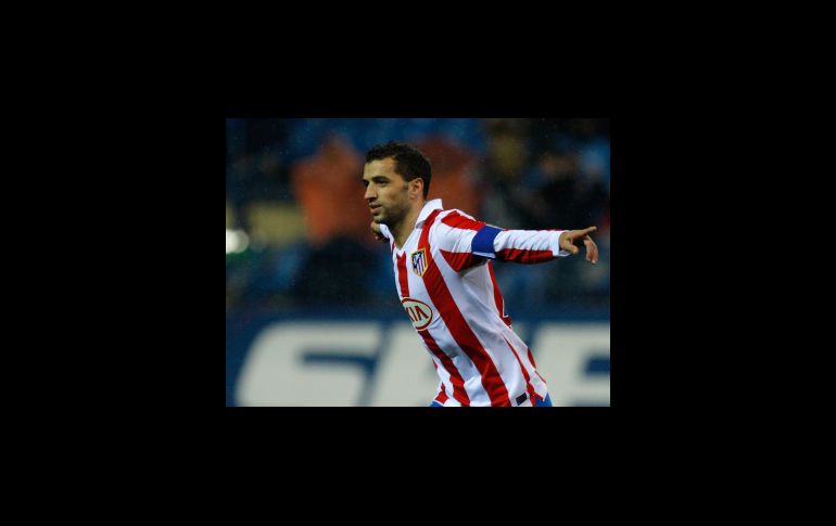 Simao Sabrosa anotó su último gol con el Atlético de Madrid en la Copa del Rey. AP  /