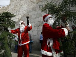 Empleados relatan que no esperaban que los ''Santas'' los asaltarán. REUTERS  /