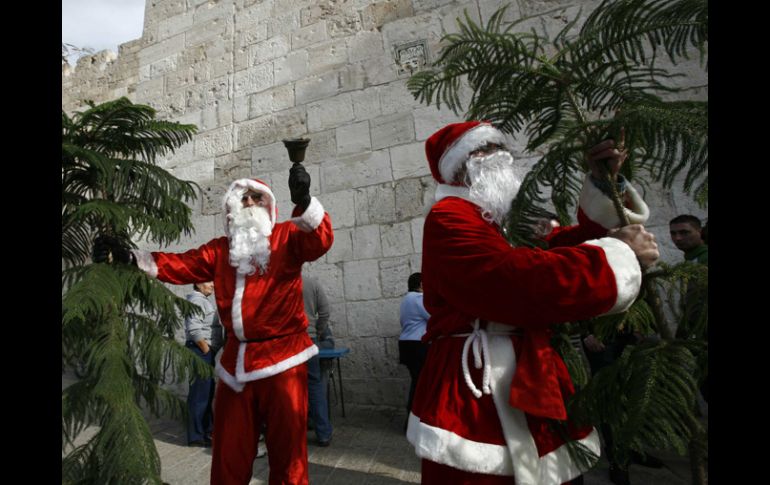 Empleados relatan que no esperaban que los ''Santas'' los asaltarán. REUTERS  /