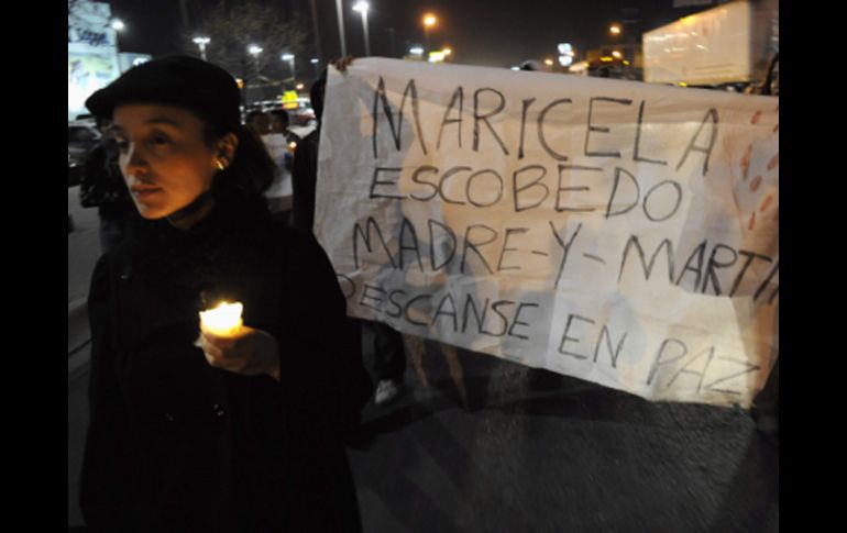 Manifestantes marchan para exigir justicia por la muerte de Marisela Escobedo en Ciudad Juárez. REUTERS  /