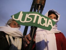 Manifestantes marcharon el miércoles, en Ciudad Juárez, para pedir justicia en nombre de la activista asesinada Marisela Escobedo. EFE  /