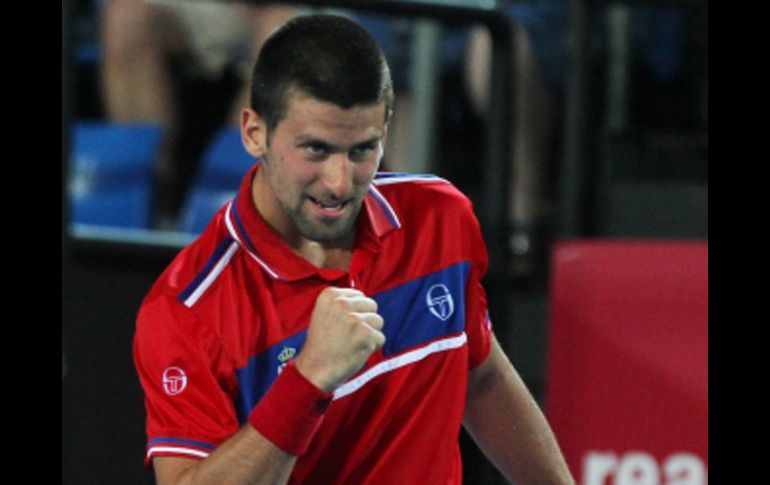 El tenista serbio Novak Djokovic festeja su victoria. AFP  /