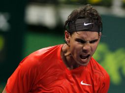 El tenista español celebra luego de derrotar al eslovaco Lukas Lacko, en la ronda de octavos de final. AP  /