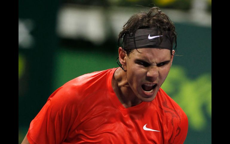 El tenista español celebra luego de derrotar al eslovaco Lukas Lacko, en la ronda de octavos de final. AP  /