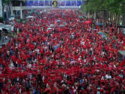 Los manifestantes lucieron sus tradicionales camisas rojas. AFP  /