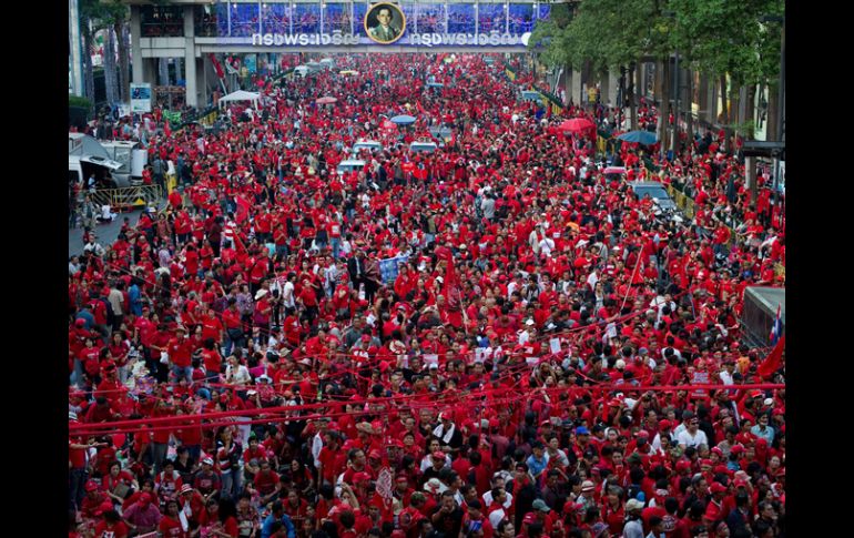 Los manifestantes lucieron sus tradicionales camisas rojas. AFP  /