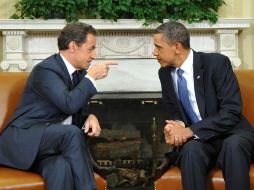 Sarkozy y Obama, reunidos en el despacho Oval. AFP  /