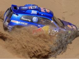 Carlos Sainz no tuvo el mejor resultado en la décima etapa del Rally Dakar 2011. AP  /