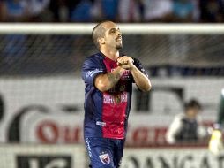 Giancarlo Maldonado celebra el tercer gol de Atlante, en la victoria de esta noche sobre Cruz Azul. MEXSPORT  /