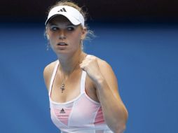 Reacción de la tenista danesa Caroline Wozniacki tras conseguir la victoria. REUTERS  /