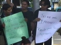 Manifestantes protestan en Manuagua contra feminicidos en México. EFE  /