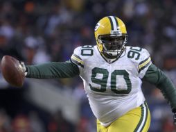 El tackle defensivo B.J. Raji (90) con una intercepción para anotación le dio a los Empacadores su quinto boleto al Super Bowl. REUTERS  /