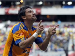 Hector Mancilla festejando la anotación que le dio el triunfo a Tigres. REUTERS  /