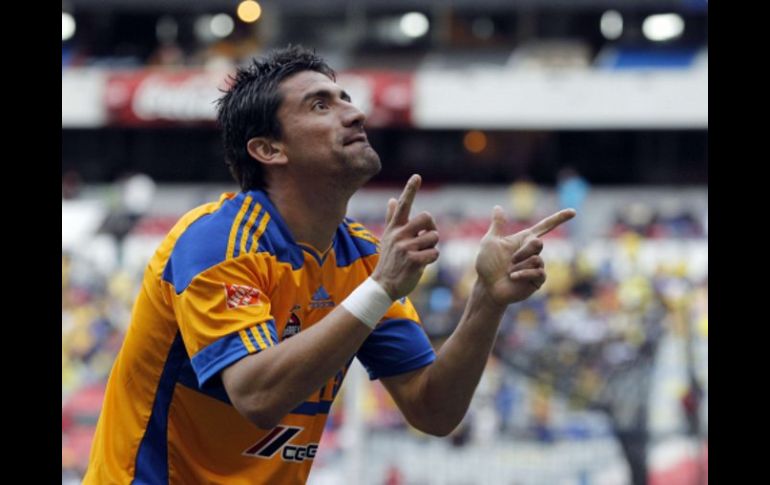 Hector Mancilla festejando la anotación que le dio el triunfo a Tigres. REUTERS  /