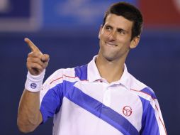 Novak Djokovic celebra la victoria sobre Roger Federer. AP  /