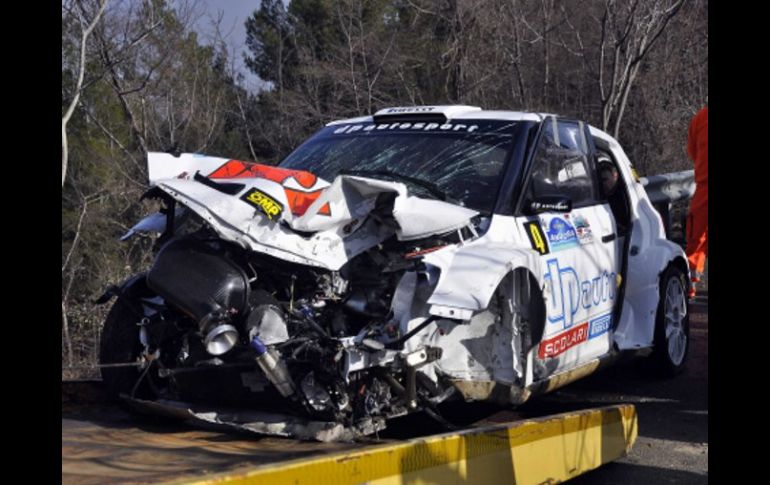 El auto de Robert Kubic tras chocar y volcarse. AP  /