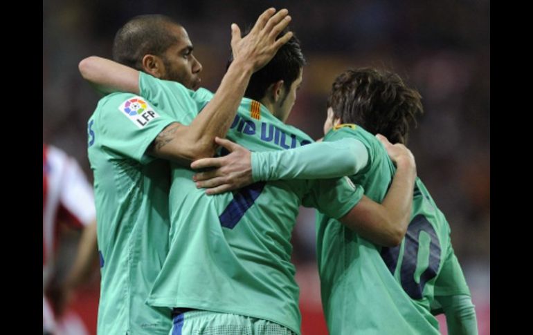 El conjunto culé en el duelo ante el Sporting de Gijon. REUTERS  /