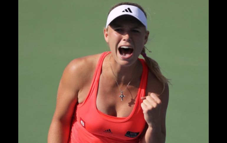 Reacción de Caroline Wozniacki tras conseguir su pase a la siguiente ronda del torneo de Dubai. AFP  /