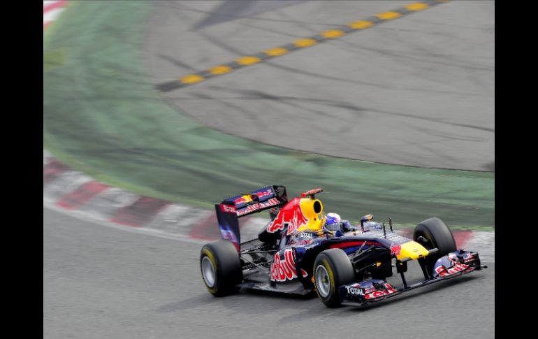 Vettel mejoró su marca del día de prácticas previo. AFP  /