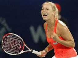 Reacción de Caroline Wozniacki después de conseguir la victoria en la final del torneo de Dubai. AFP  /