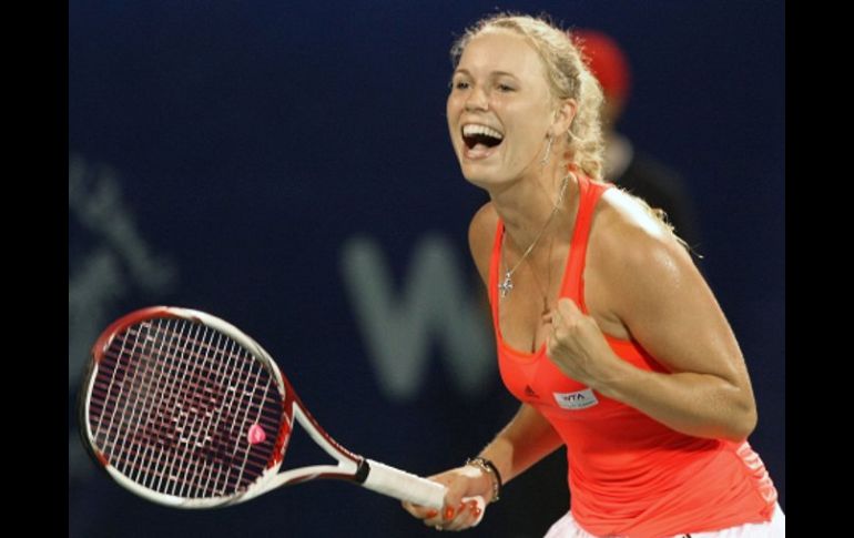 Reacción de Caroline Wozniacki después de conseguir la victoria en la final del torneo de Dubai. AFP  /