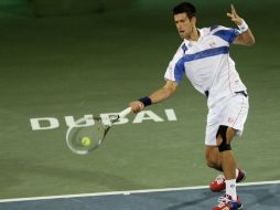 Djokovic venció a Feliciano López en la segunda ronda del torneo de Dubai. AFP  /