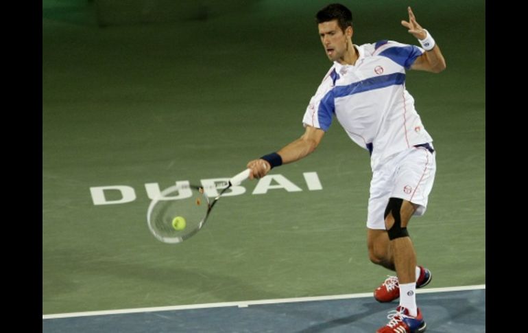 Djokovic venció a Feliciano López en la segunda ronda del torneo de Dubai. AFP  /