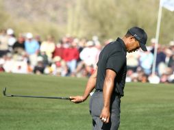 Tiger Woods llevó su duelo con Thomas Bjorn hasta el hoyo 19, pero ahí hizo doble bogey y perdió. REUTERS  /