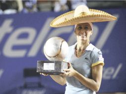 La argentina Gisela Dulko sumó 280 puntos a su ránking y se llevó un premio de 37 mil dólares. MEXSPORT  /